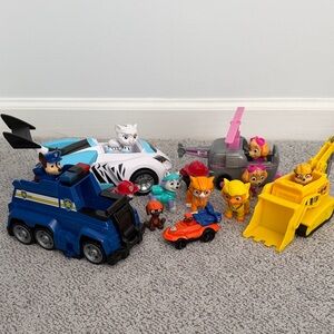 Paw patrol characters & play sets as shown.Colorful Rescue Vehicle Playsets. $35